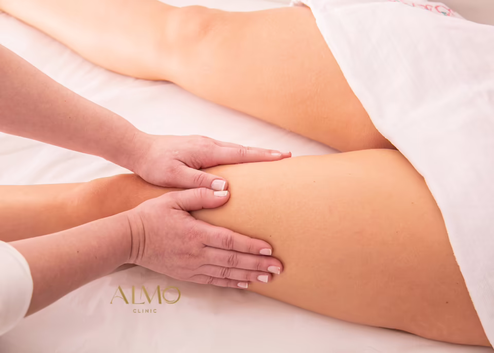 When to start lymphatic massage after lipo Therapist's hands gliding up the thigh during a gentle lymphatic massage